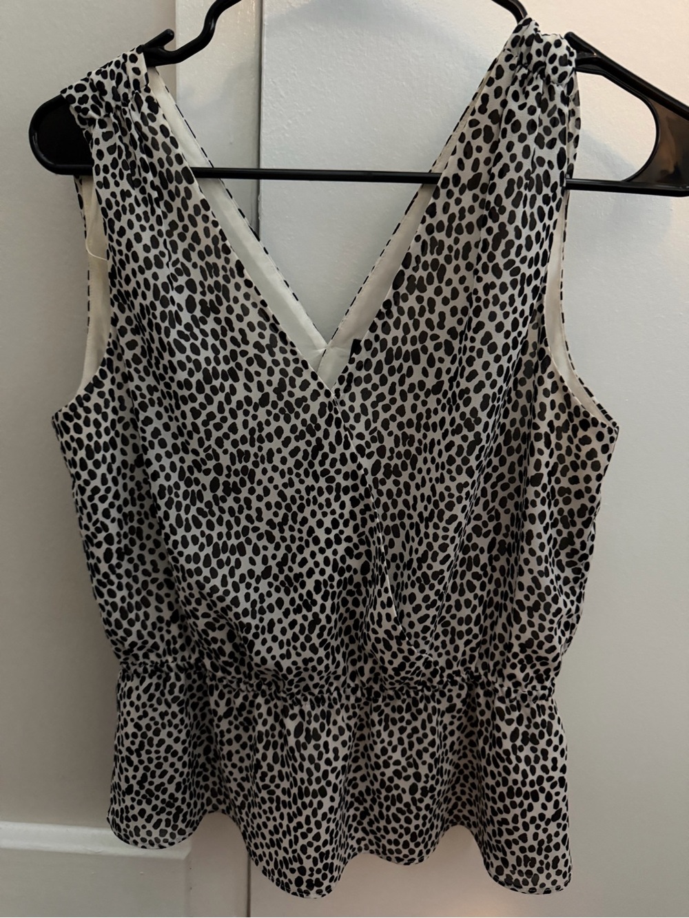 Sleeveless Black & White Dot Peplum Top